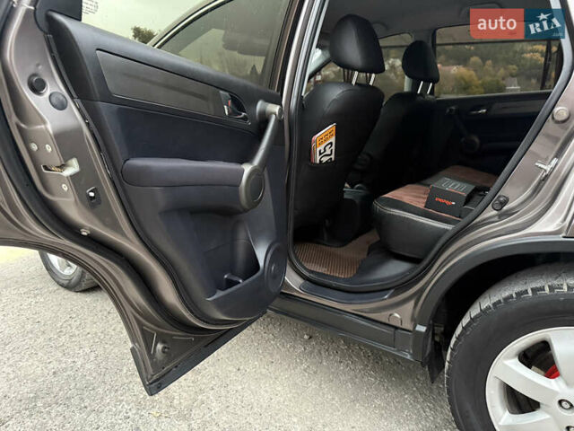 Коричневый Хонда СРВ, объемом двигателя 2.2 л и пробегом 187 тыс. км за 13000 $, фото 36 на Automoto.ua