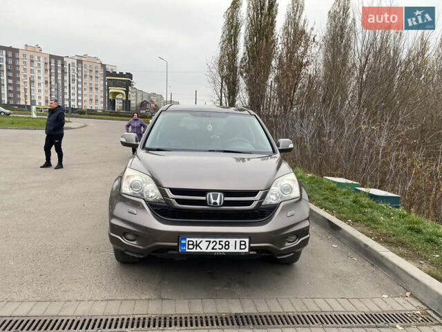 Коричневый Хонда СРВ, объемом двигателя 2.2 л и пробегом 234 тыс. км за 14300 $, фото 1 на Automoto.ua