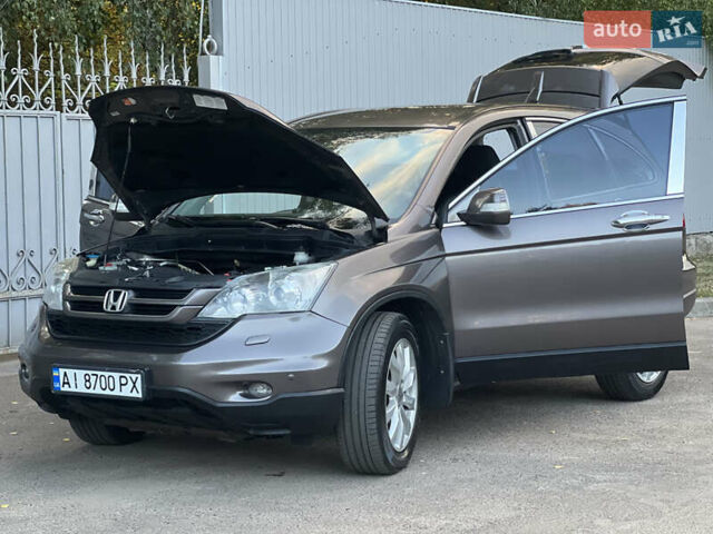 Коричневый Хонда СРВ, объемом двигателя 2.35 л и пробегом 201 тыс. км за 14700 $, фото 1 на Automoto.ua