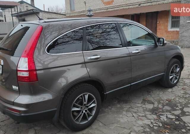 Коричневый Хонда СРВ, объемом двигателя 2.2 л и пробегом 232 тыс. км за 14700 $, фото 9 на Automoto.ua