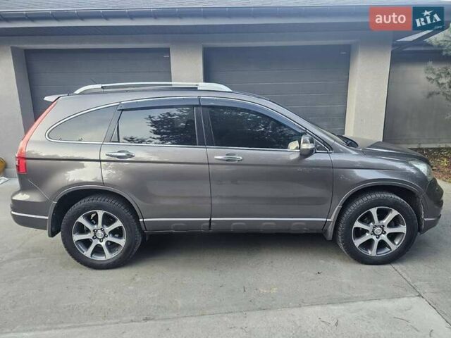 Коричневый Хонда СРВ, объемом двигателя 2.4 л и пробегом 200 тыс. км за 14300 $, фото 1 на Automoto.ua