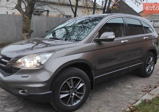 Коричневый Хонда СРВ, объемом двигателя 2.2 л и пробегом 232 тыс. км за 14700 $, фото 1 на Automoto.ua