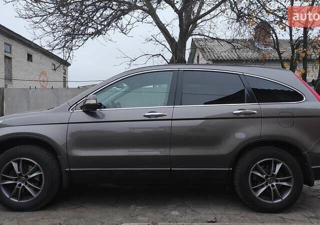 Коричневый Хонда СРВ, объемом двигателя 2.2 л и пробегом 232 тыс. км за 14700 $, фото 11 на Automoto.ua