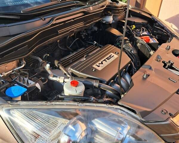 Коричневый Хонда СРВ, объемом двигателя 2.4 л и пробегом 207 тыс. км за 13600 $, фото 1 на Automoto.ua