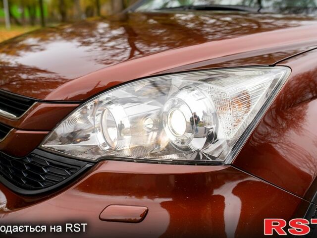 Коричневый Хонда СРВ, объемом двигателя 2.4 л и пробегом 132 тыс. км за 15000 $, фото 1 на Automoto.ua