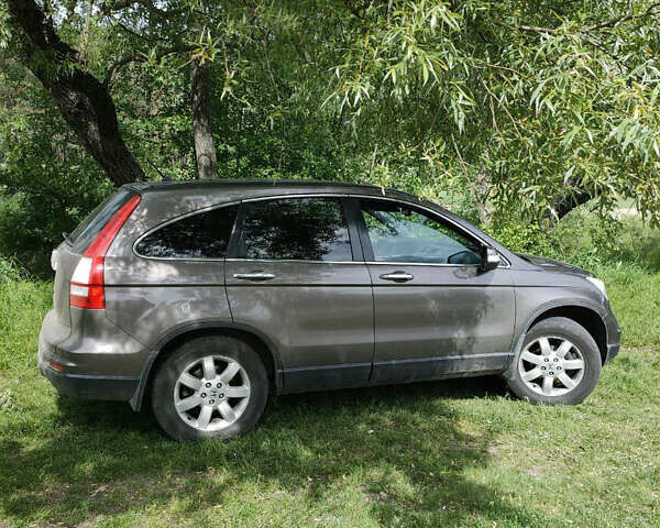 Коричневый Хонда СРВ, объемом двигателя 2.2 л и пробегом 280 тыс. км за 14000 $, фото 1 на Automoto.ua