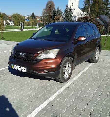 Коричневый Хонда СРВ, объемом двигателя 2 л и пробегом 190 тыс. км за 12500 $, фото 1 на Automoto.ua