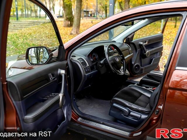 Коричневый Хонда СРВ, объемом двигателя 2.4 л и пробегом 132 тыс. км за 15000 $, фото 12 на Automoto.ua