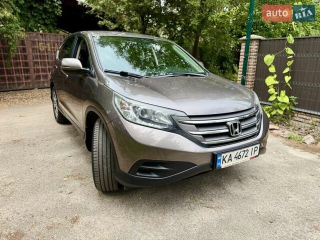 Коричневий Хонда СРВ, об'ємом двигуна 2.35 л та пробігом 216 тис. км за 15700 $, фото 4 на Automoto.ua