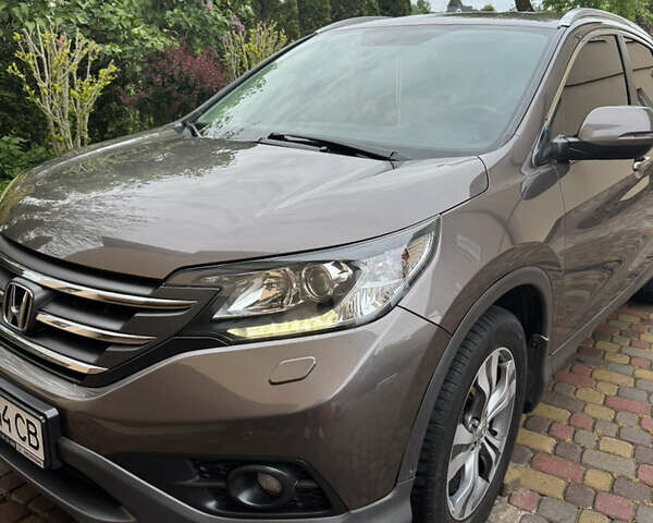 Коричневый Хонда СРВ, объемом двигателя 2 л и пробегом 169 тыс. км за 17500 $, фото 2 на Automoto.ua