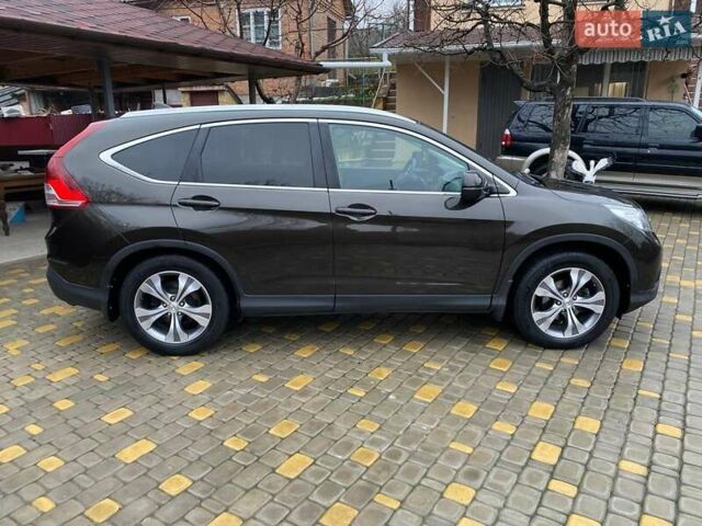 Коричневый Хонда СРВ, объемом двигателя 2.4 л и пробегом 213 тыс. км за 16800 $, фото 4 на Automoto.ua