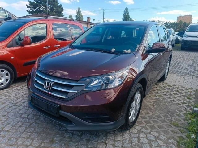 Коричневый Хонда СРВ, объемом двигателя 2 л и пробегом 164 тыс. км за 12500 $, фото 1 на Automoto.ua