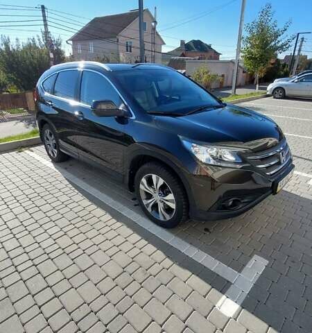 Хонда СРВ 2013 у Вінниці на Automoto.ua Коричневий Хонда СРВ, об'ємом двигуна 2.35 л та пробігом 164 тис. км за 17999 $, фото 1 на Automoto.ua