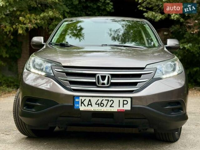 Коричневий Хонда СРВ, об'ємом двигуна 2.35 л та пробігом 216 тис. км за 15700 $, фото 1 на Automoto.ua