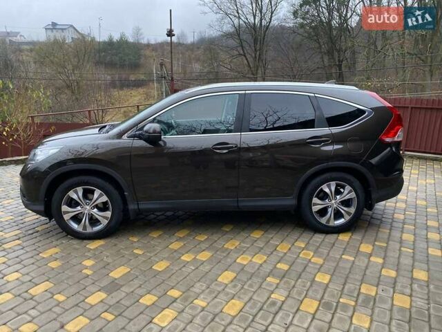 Коричневый Хонда СРВ, объемом двигателя 2.4 л и пробегом 213 тыс. км за 16800 $, фото 1 на Automoto.ua