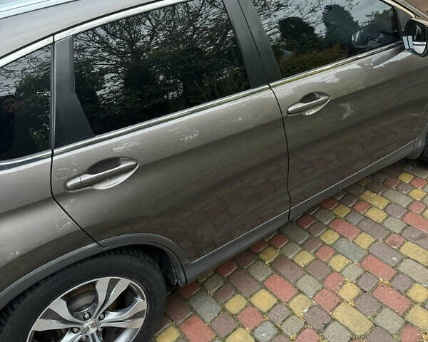 Коричневый Хонда СРВ, объемом двигателя 2 л и пробегом 169 тыс. км за 17500 $, фото 7 на Automoto.ua