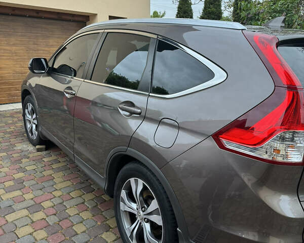 Коричневый Хонда СРВ, объемом двигателя 2 л и пробегом 169 тыс. км за 17500 $, фото 4 на Automoto.ua