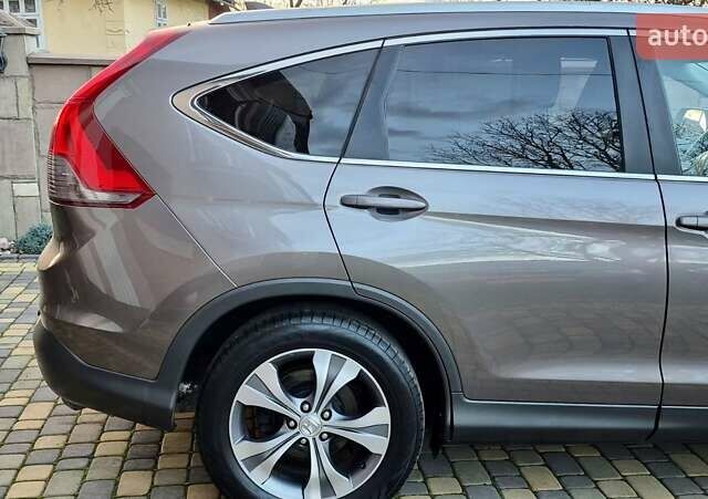 Коричневый Хонда СРВ, объемом двигателя 1.6 л и пробегом 230 тыс. км за 14900 $, фото 9 на Automoto.ua