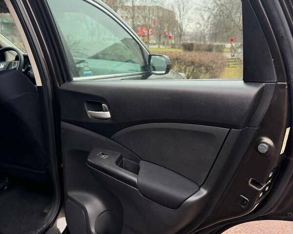 Коричневий Хонда СРВ, об'ємом двигуна 2.36 л та пробігом 230 тис. км за 16800 $, фото 9 на Automoto.ua