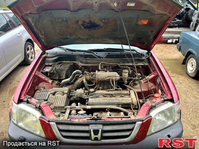 Красный Хонда СРВ, объемом двигателя 2 л и пробегом 245 тыс. км за 3000 $, фото 5 на Automoto.ua