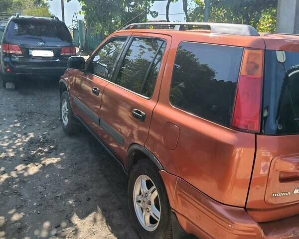 Красный Хонда СРВ, объемом двигателя 2 л и пробегом 419 тыс. км за 5000 $, фото 5 на Automoto.ua