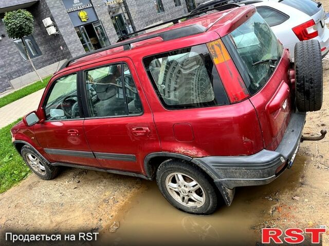 Красный Хонда СРВ, объемом двигателя 2 л и пробегом 245 тыс. км за 3000 $, фото 1 на Automoto.ua