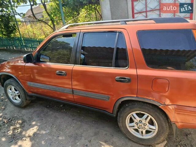 Красный Хонда СРВ, объемом двигателя 2 л и пробегом 419 тыс. км за 5000 $, фото 4 на Automoto.ua