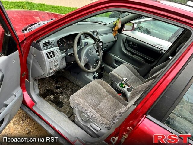 Красный Хонда СРВ, объемом двигателя 2 л и пробегом 245 тыс. км за 3000 $, фото 3 на Automoto.ua