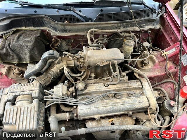 Красный Хонда СРВ, объемом двигателя 2 л и пробегом 245 тыс. км за 3000 $, фото 7 на Automoto.ua