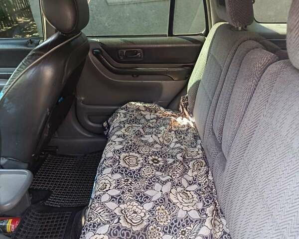 Красный Хонда СРВ, объемом двигателя 2 л и пробегом 419 тыс. км за 5000 $, фото 1 на Automoto.ua