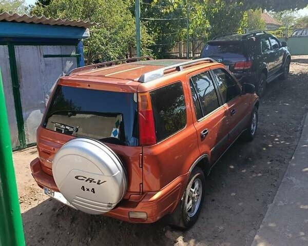 Красный Хонда СРВ, объемом двигателя 2 л и пробегом 419 тыс. км за 5000 $, фото 7 на Automoto.ua