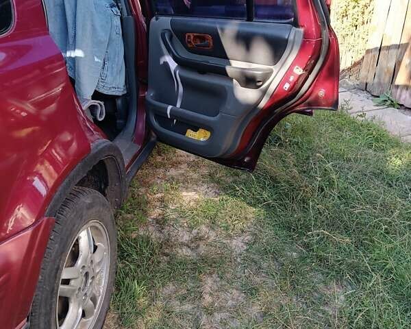Червоний Хонда СРВ, об'ємом двигуна 2 л та пробігом 300 тис. км за 3900 $, фото 1 на Automoto.ua