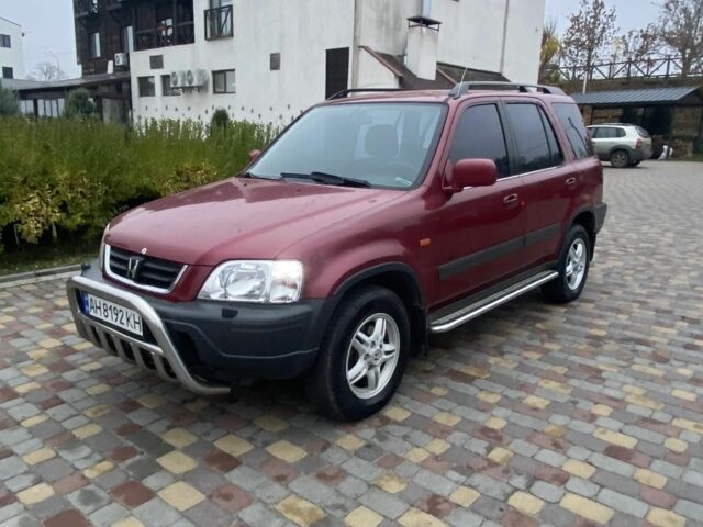 Красный Хонда СРВ, объемом двигателя 2 л и пробегом 217 тыс. км за 5100 $, фото 1 на Automoto.ua