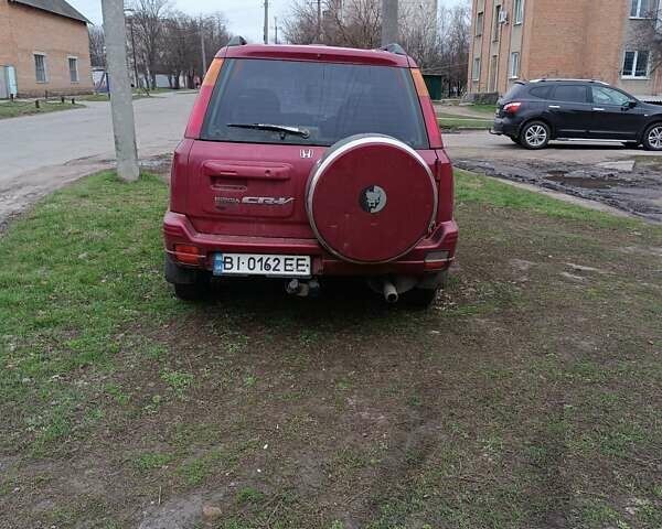 Червоний Хонда СРВ, об'ємом двигуна 2 л та пробігом 300 тис. км за 3900 $, фото 3 на Automoto.ua