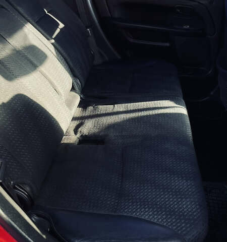 Красный Хонда СРВ, объемом двигателя 2 л и пробегом 408 тыс. км за 6500 $, фото 20 на Automoto.ua