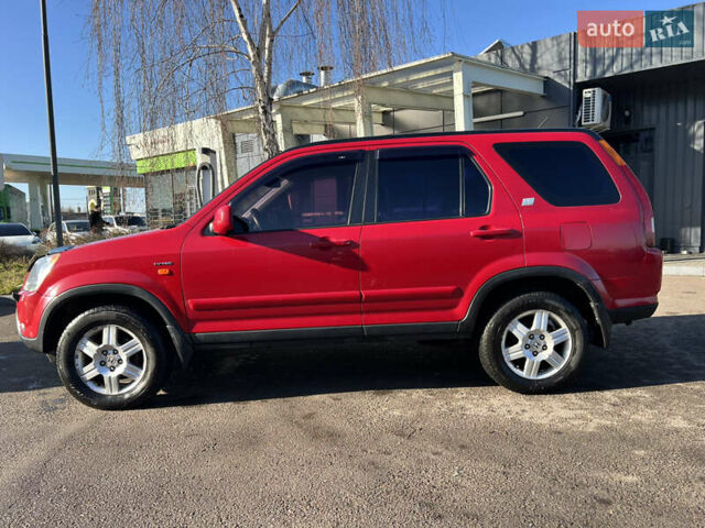 Красный Хонда СРВ, объемом двигателя 2 л и пробегом 408 тыс. км за 6500 $, фото 6 на Automoto.ua