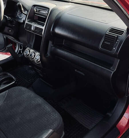 Красный Хонда СРВ, объемом двигателя 2 л и пробегом 408 тыс. км за 6500 $, фото 17 на Automoto.ua