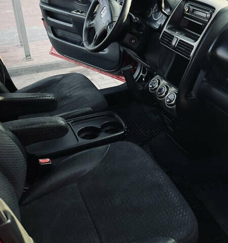 Красный Хонда СРВ, объемом двигателя 2 л и пробегом 408 тыс. км за 6500 $, фото 16 на Automoto.ua