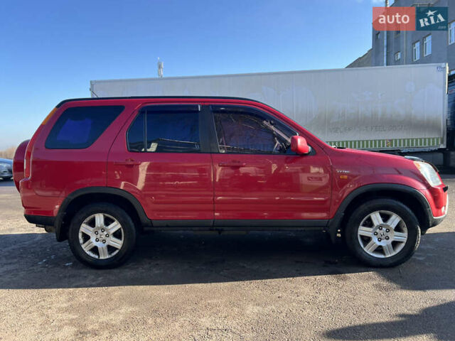Красный Хонда СРВ, объемом двигателя 2 л и пробегом 408 тыс. км за 6500 $, фото 2 на Automoto.ua
