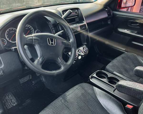 Красный Хонда СРВ, объемом двигателя 2 л и пробегом 408 тыс. км за 6500 $, фото 14 на Automoto.ua