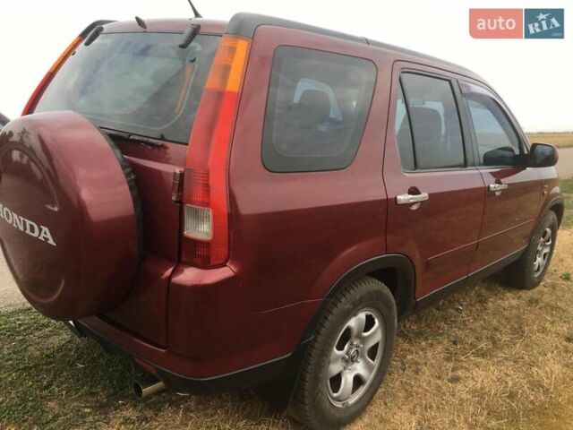 Красный Хонда СРВ, объемом двигателя 2 л и пробегом 230 тыс. км за 7200 $, фото 3 на Automoto.ua