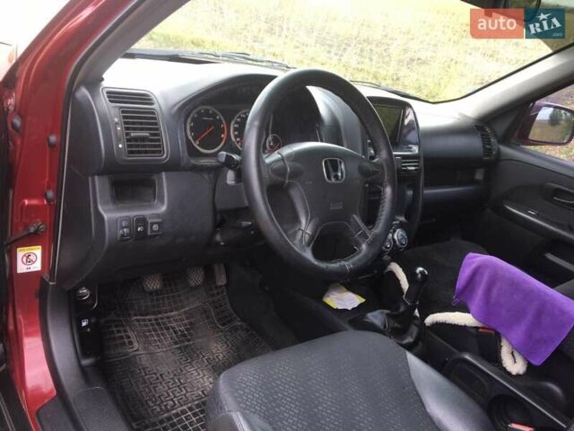 Красный Хонда СРВ, объемом двигателя 2 л и пробегом 230 тыс. км за 7200 $, фото 5 на Automoto.ua