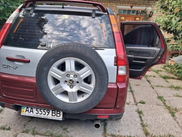 Червоний Хонда СРВ, об'ємом двигуна 2 л та пробігом 275 тис. км за 4950 $, фото 1 на Automoto.ua