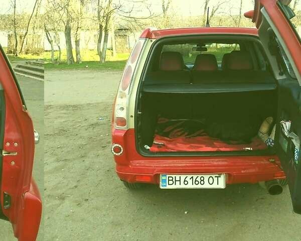 Червоний Хонда СРВ, об'ємом двигуна 2 л та пробігом 195 тис. км за 6800 $, фото 3 на Automoto.ua