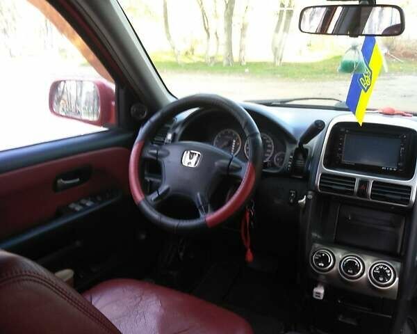 Червоний Хонда СРВ, об'ємом двигуна 2 л та пробігом 195 тис. км за 6800 $, фото 6 на Automoto.ua