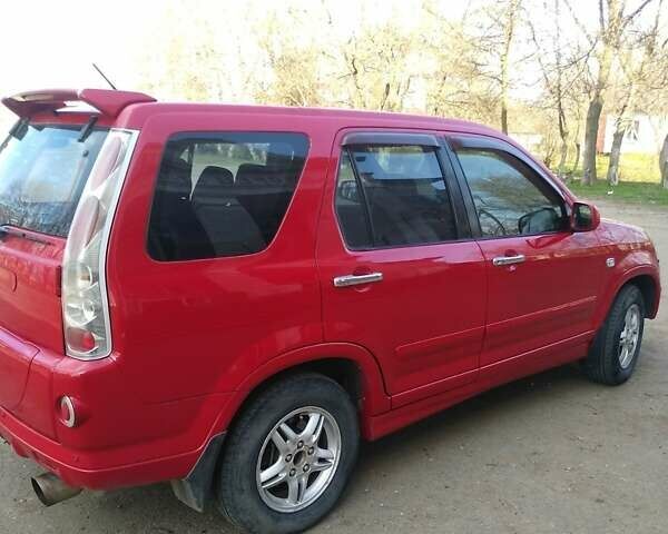 Червоний Хонда СРВ, об'ємом двигуна 2 л та пробігом 195 тис. км за 6800 $, фото 4 на Automoto.ua