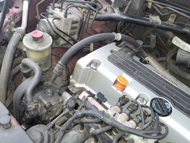 Красный Хонда СРВ, объемом двигателя 2 л и пробегом 257 тыс. км за 6876 $, фото 7 на Automoto.ua