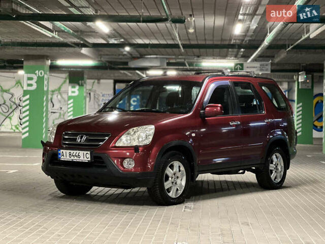 Красный Хонда СРВ, объемом двигателя 2 л и пробегом 257 тыс. км за 7300 $, фото 1 на Automoto.ua