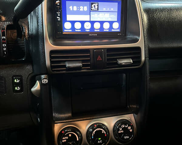 Красный Хонда СРВ, объемом двигателя 2 л и пробегом 257 тыс. км за 7300 $, фото 4 на Automoto.ua