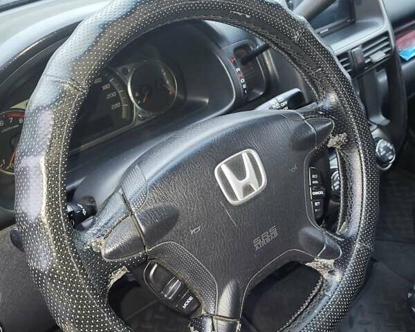 Красный Хонда СРВ, объемом двигателя 2 л и пробегом 257 тыс. км за 6876 $, фото 5 на Automoto.ua